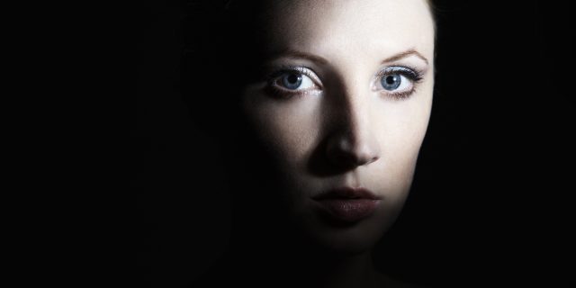 If You're Thinking About Your Health and Asking, 'How Did This Happen?' A woman with a dark shadow covering some of her face.