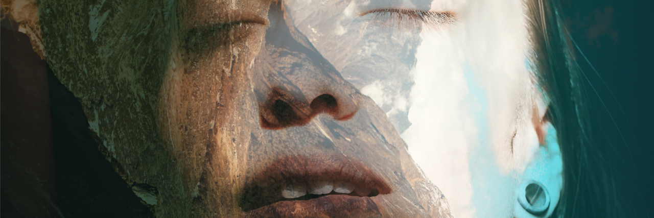 Double exposure portrait of attractive woman combined with photograph of Himalayas