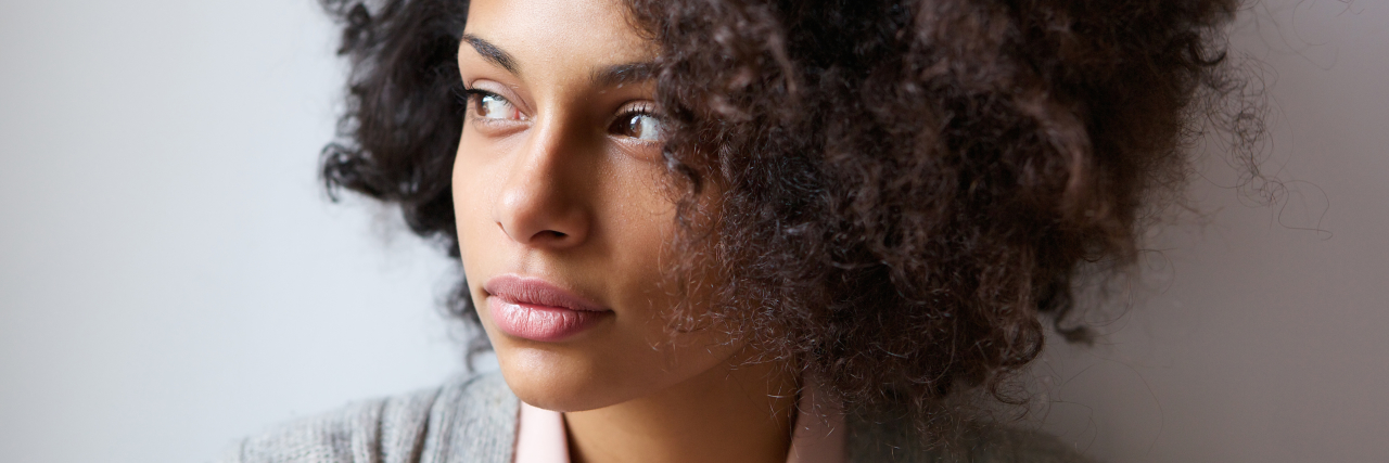 Deciding Whether to Take Alglucosidase Alfa for Pompe Disease woman looking away in thought