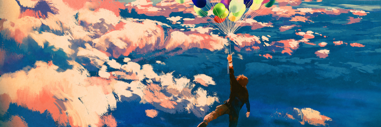 When Anxiety Is a Fight Against Your Own Thoughts A man with a bunch of balloons floating in the air