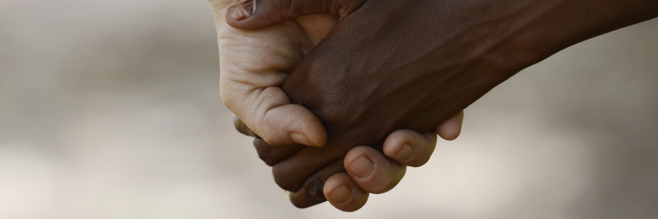 How a New Mental Health Program Is Helping Ontario's Aboriginals Heal African Peace Symbol. White woman holds hands with a little native African girl, in Bamako, Mali. A black child and a white woman hold hands. Peace on earth symbol. Took this pic during my stay in Bamako, Mali in September 2015. A beautiful shot with lots of possible background symbols. No to Racism!