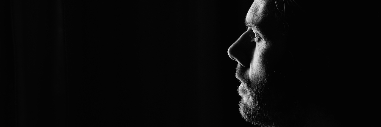 My Brother With Schizophrenia Died by Suicide man looking away