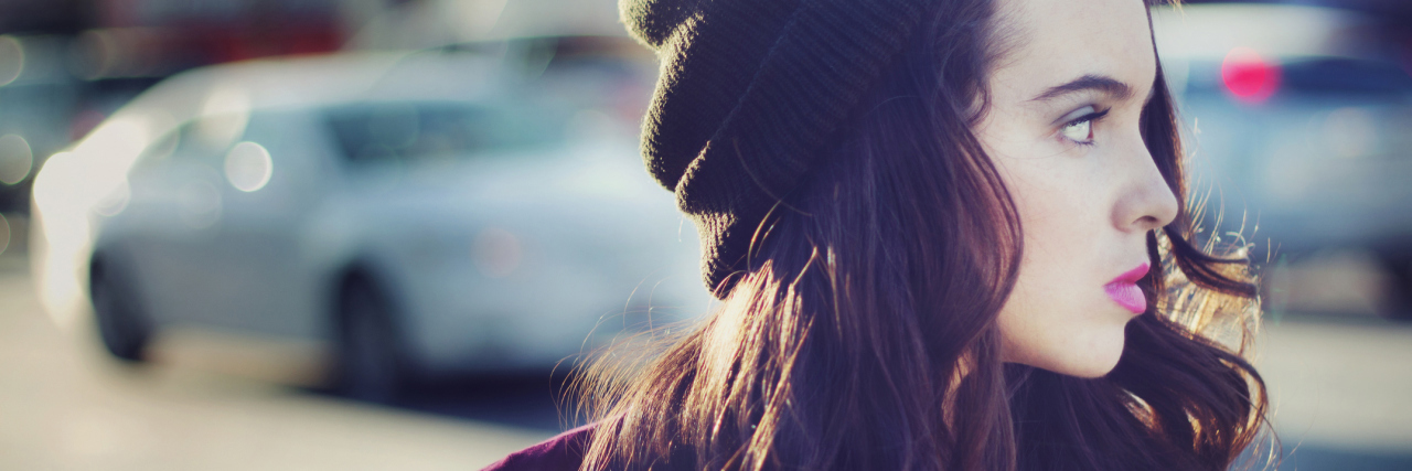 Why My Self-Harm Scars Aren't Beautiful Stock image portrait of urban teen walking outdoors with a blank stare