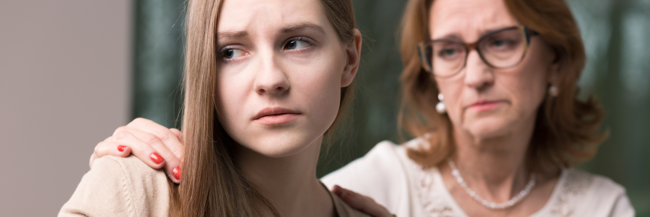 How to Help Your Child Through a Mental Health Crisis worried teen girl and supportive mother