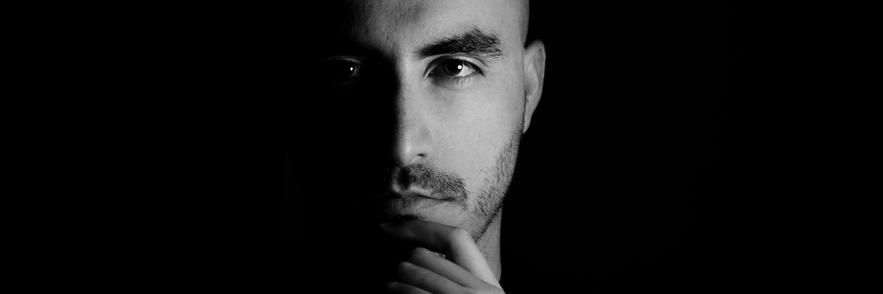 Having a Great 'Poker Face' as Someone With Mental Illness Male portrait in studio