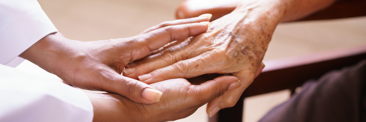 From Being Diagnosed to Beating the Odds: My Mother's Cancer Story Senior Woman Talking With Black Doctor In Hospice