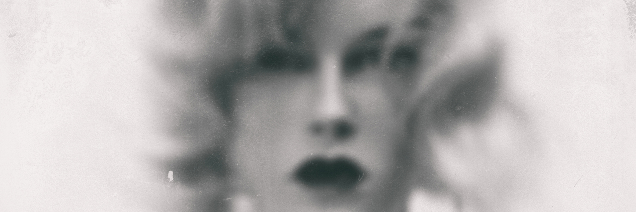 What Fatigue Really Feels Like A black and white vintage image of a woman, slightly blurred.