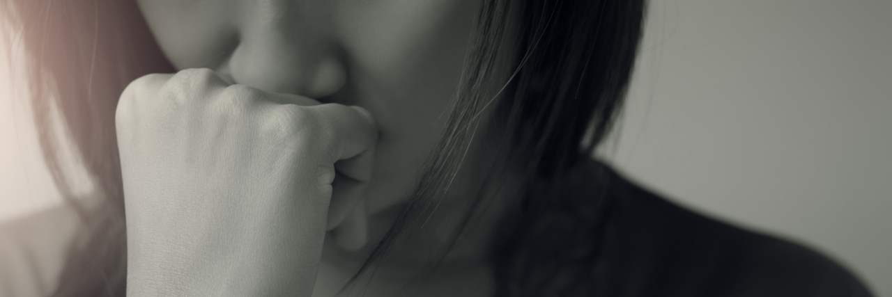 The Pain of Losing Two of My Loved Ones to Ovarian Cancer Sad woman black and white closeup