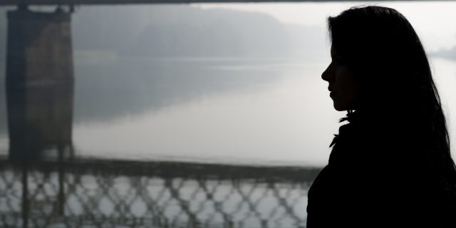 How This Holiday Season Is Different as I Face Breast Cancer Silhouette girl and bridge over river in autumn