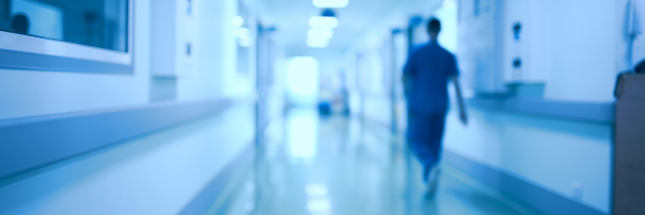 How It Feels When Doctors Give Up On You and Your Endometriosis Hospital corridor and doctor as a blurred defocused background