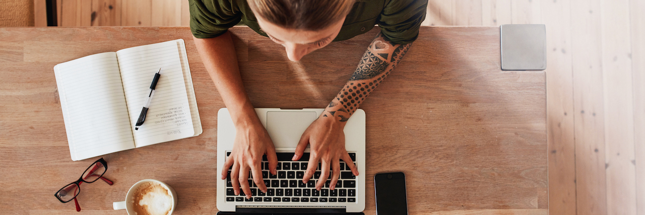 Things You Do When You're an Anxious Workaholic Woman working on her laptop