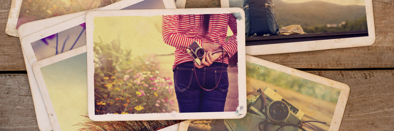 Photos on a wooden table.