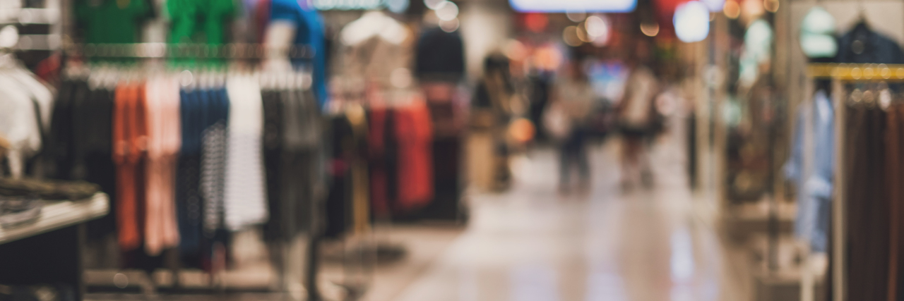 Finding Acceptance and Support on the Autism Journey Abstract blurred background of department store.