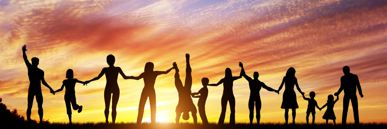 Standing Together as Neurodiverse People Happy group of diverse people together hand in hand.