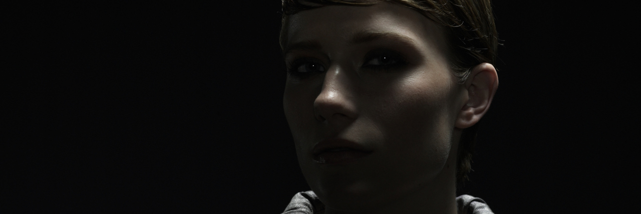 When Chronic Illness Stopped Me From Living the Life of My Dreams A woman in a shadow.