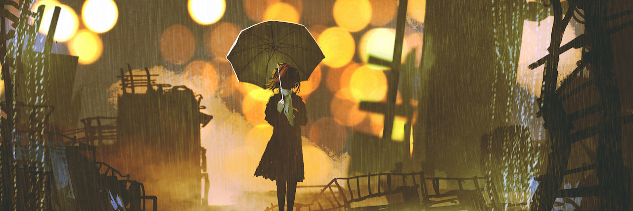 When Borderline Personality Disorder Makes You Live With Two Truths Woman holding an umbrella