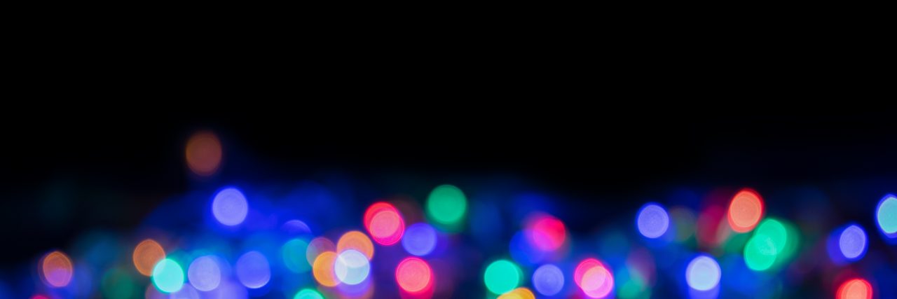 Blurred and defocused christmas colorful lights abstract background