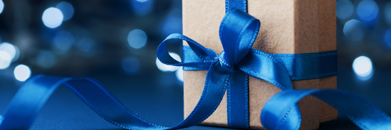 gift wrapped in blue ribbon