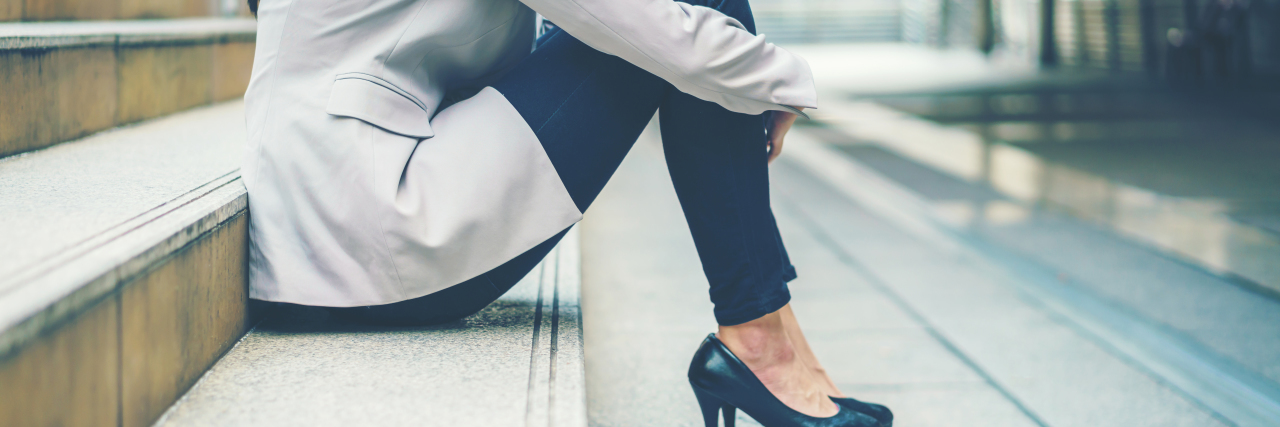 What Working on My Worst Depression Days Is Like Business woman stressed from work while sitting outdoors on the stairs, concept work life balance, burn out syndrome, press from colleagues.