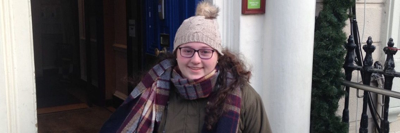 When My Hospitalization Gave Me a Second Family The writer standing in front of the children's hospital.