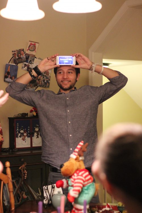 family playing game at christmas