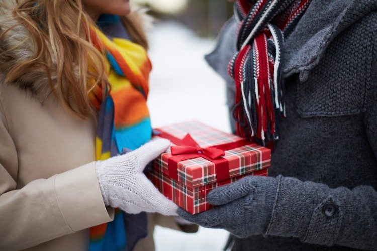 couple exchanging gifts 