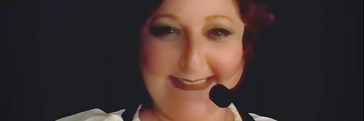 I Am Lupus A photo of the writer smiling.