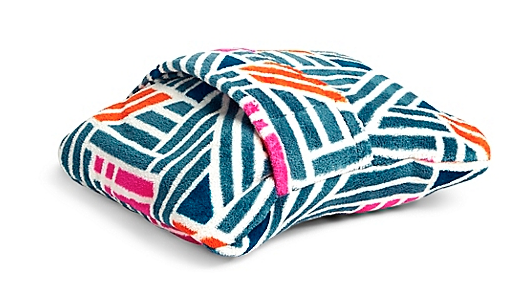 striped blanket folded into a pillow
