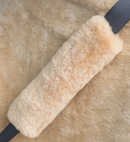 white sheepskin seat belt cover