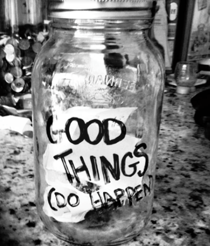 A jar written on with a Sharpie, "Good Things (Do Happen)."