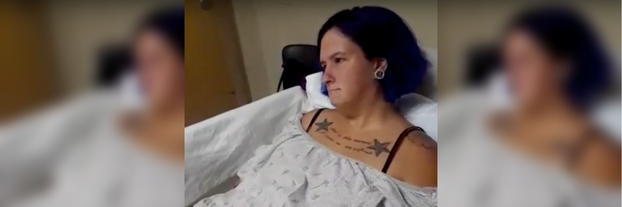 Publicly Sharing a Video of a Tardive Dyskinesia Episode woman in hospital gown
