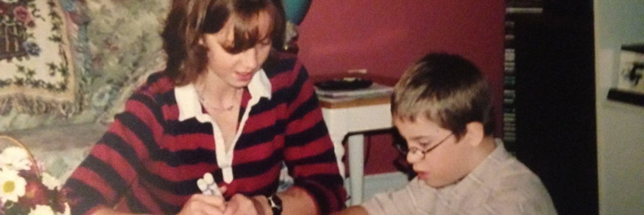 My Son With Down Syndrome Is Brilliant Boy with down syndrome working with speech therapist at home