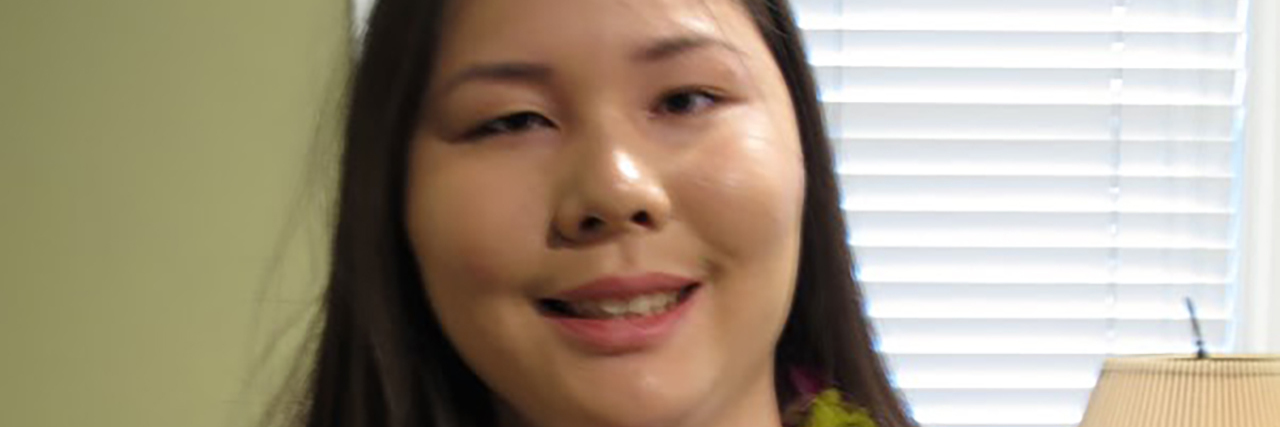 Autism Stereotypes I Would Like to Dismiss Christine Motokane, young Asian-American woman wearing Hawaiian lei.