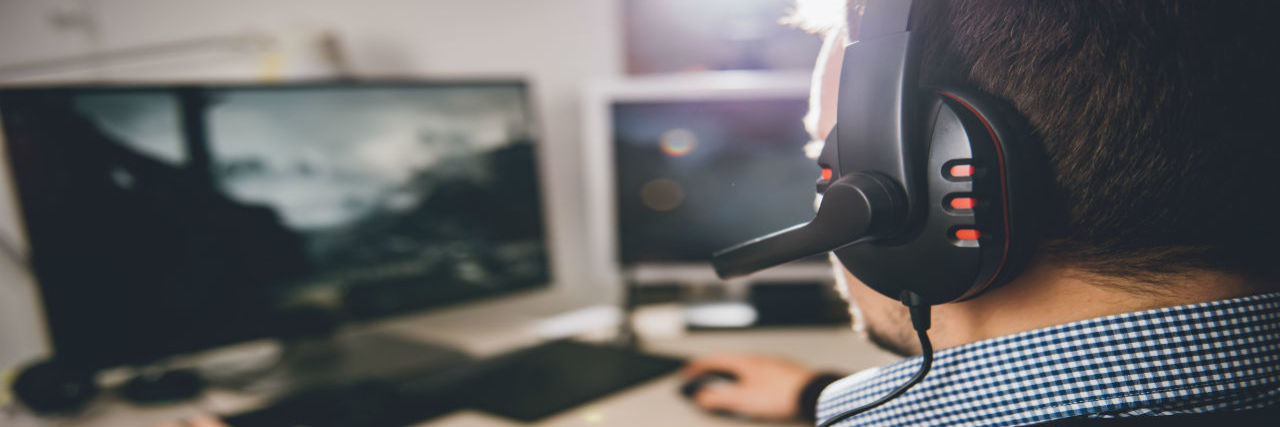 WHO to Recognize Gaming Disorder as a Mental Illness Man playing a computer video game