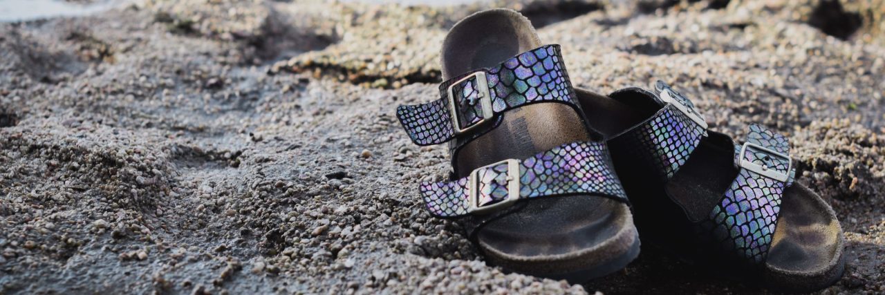 When You Wonder If Your Anxiety Will Last Forever sandels on sandy beach close up