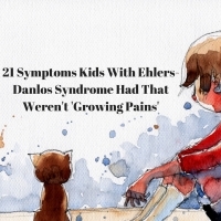 21 Symptoms Kids With Ehlers-Danlos Syndrome Had That Weren't 'Growing Pains' with watercolor of child sitting next to cat