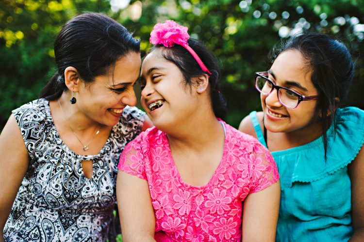 Mom with two daughters, one of them has Down syndrome