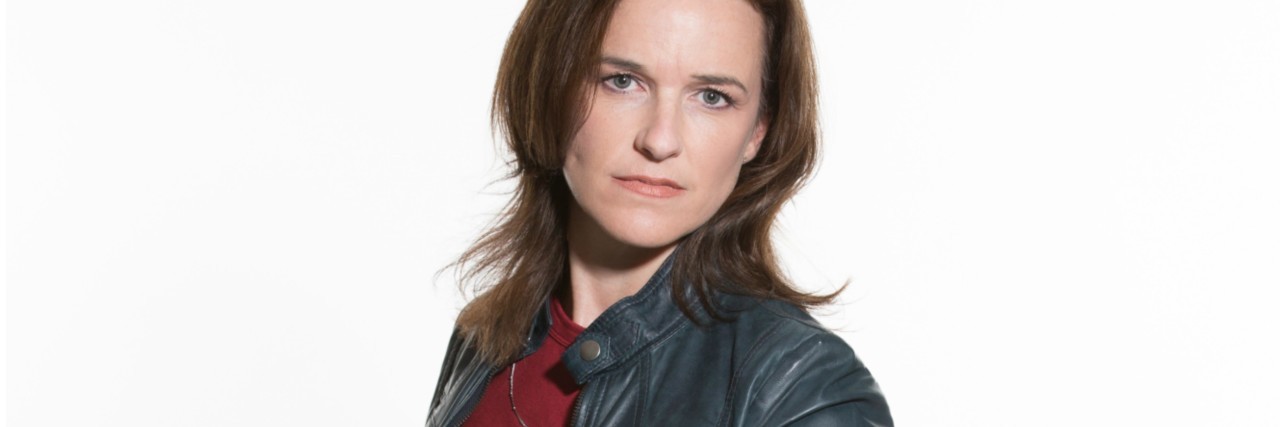 How I Rose From the Shame of Sexual Assault and PTSD woman with rose on fire tattoo for sexual assault survivors collage holding hands