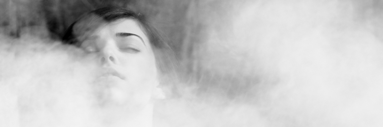 The Beast Called Fibromyalgia A woman being overcome by fog.