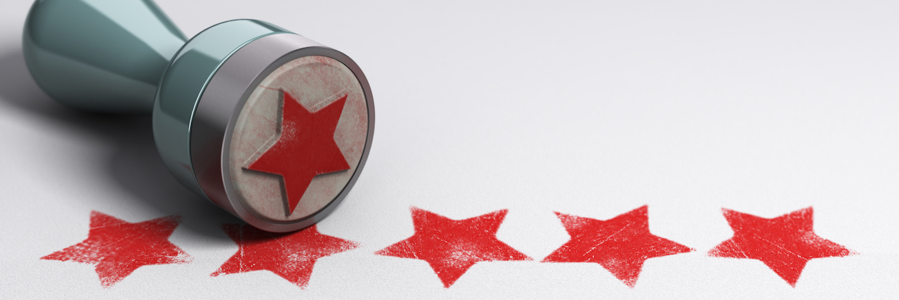 5 Unexpected Dangers of Perfectionism a star stamp with five stars