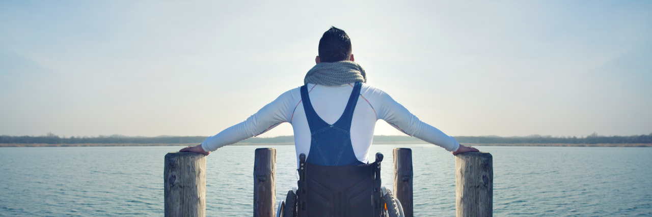 What It Feels Like When Inclusion Body Myositis Progresses man in wheelchair looking out at the ocean