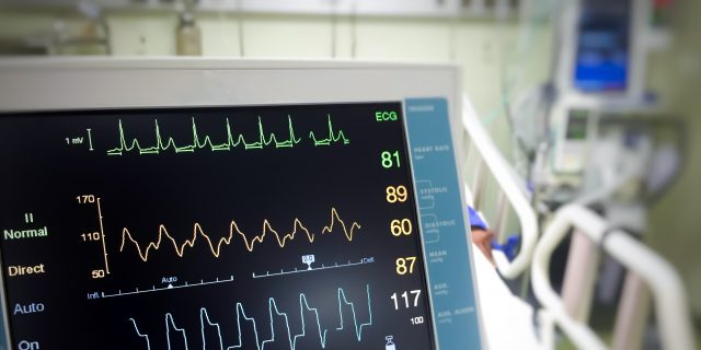 When a Routine Cerebral Palsy Surgery Almost Killed Me Close up EKG monitor in ICU room.