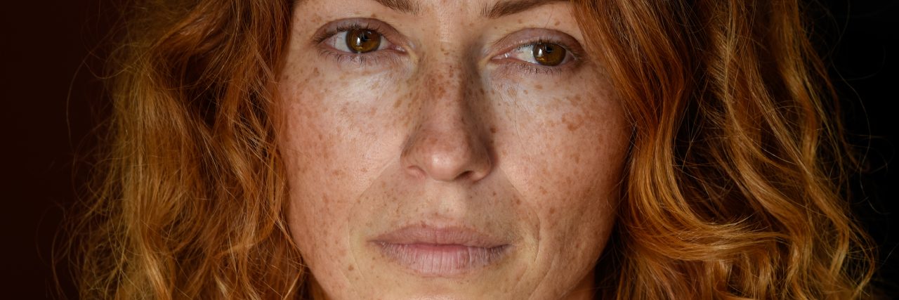 The Problem With Giving This Advice to Someone Who 'Depression Naps' Portrait of redhead melancholic woman