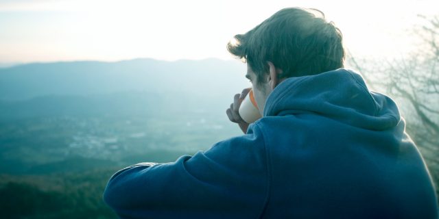10 Simple Things That Help Me Cope With My Anxiety man drinking coffee looking at view
