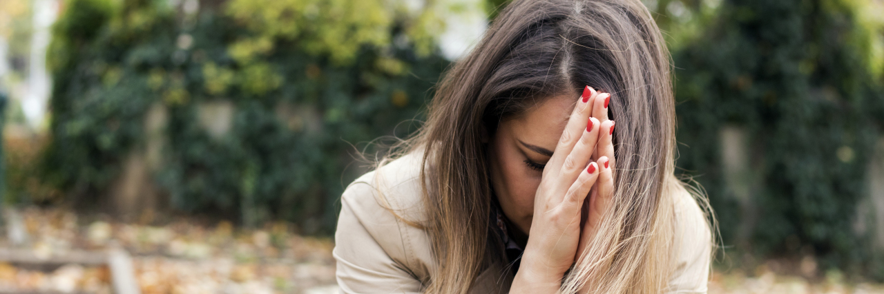 woman praying outside