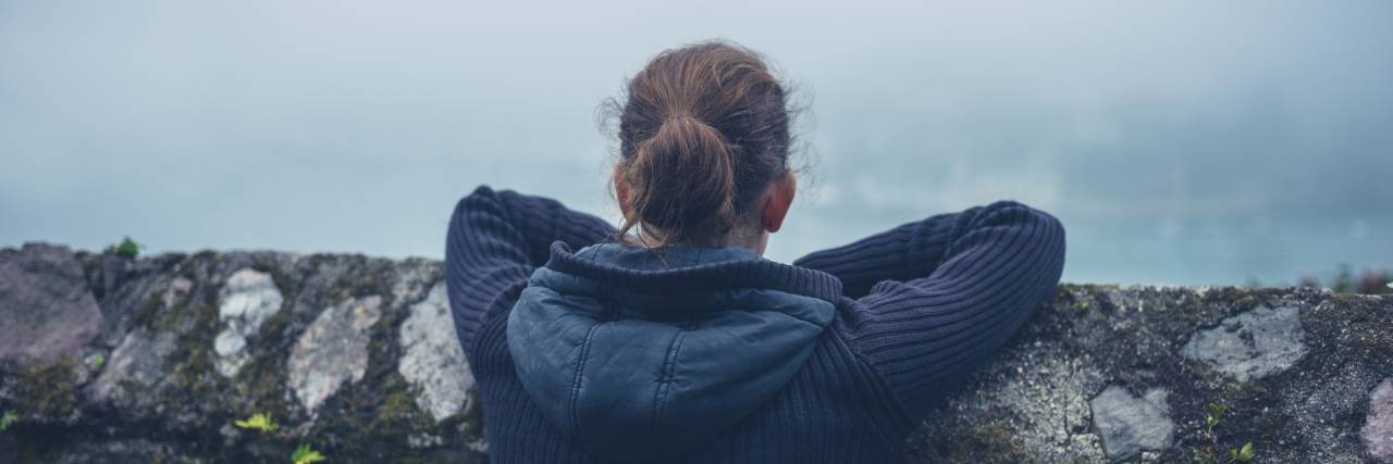 The Thoughts I Have During a Typical Day With Leukemia Young woman looking at mist