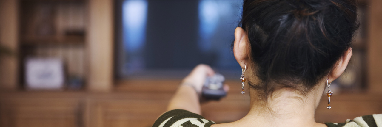 The One Movie That Unexpectedly Comforted My Anxious Mind Back View of Woman Watching Television