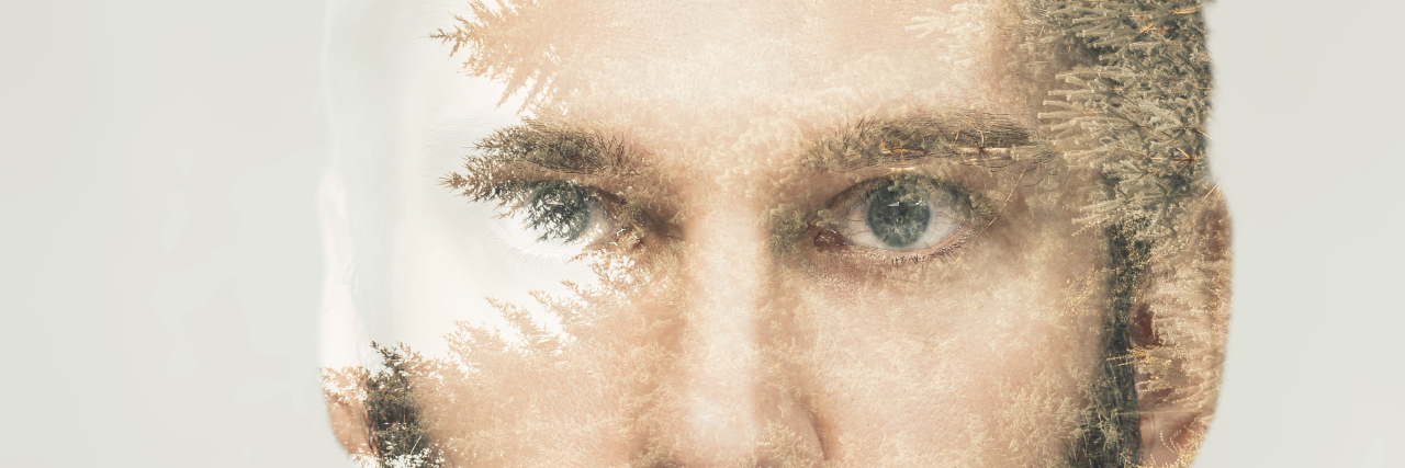 What the 'Riptide' of an Autism Meltdown Feels Like Double exposure if a man with mountain forest