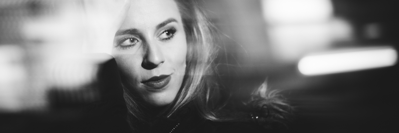 Sharing My Story With Rheumatoid Arthritis for Rheumatoid Awareness black and white blurred photo of a woman