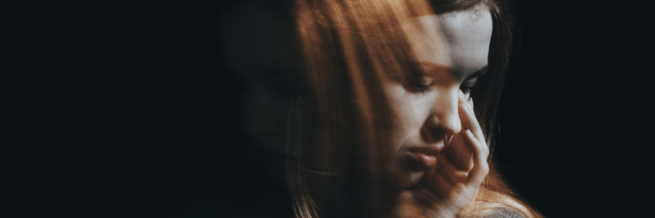 When Your Mental Illness Is Continually Misdiagnosed Sad girl crying because of anxiety and personality disorder. Black background with copy space